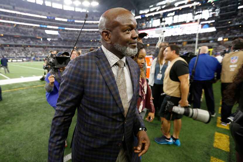 Emmitt Smith walks off the field prior to the kick off between Dallas Cowboys and Green Bay...