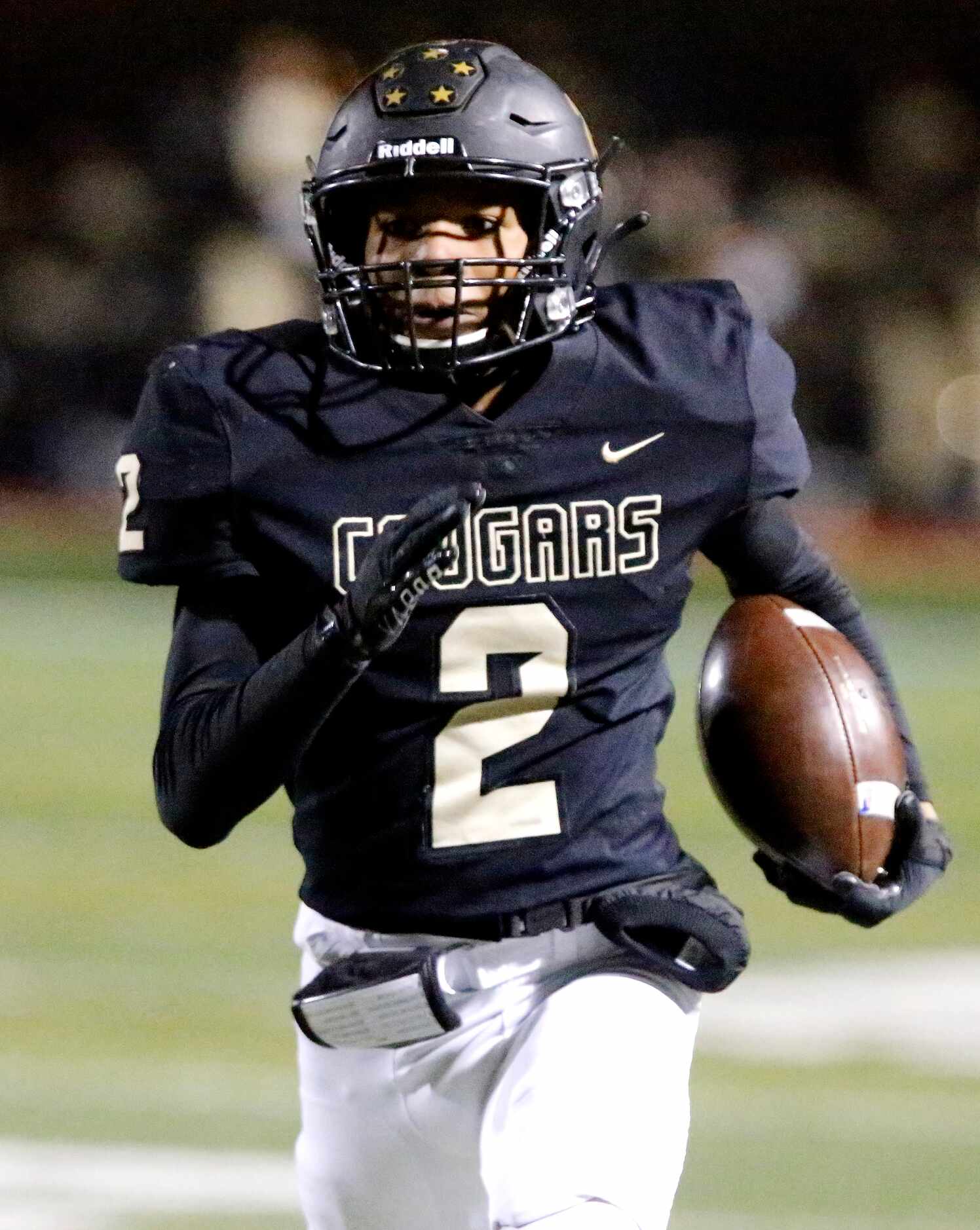 The Colony High School wide receiver Shafiq Taylor (2) makes a long run after the catch...