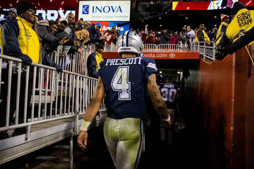Dallas Cowboys quarterback Dak Prescott (4) leaves the stadium after the Dallas Cowboys lost...