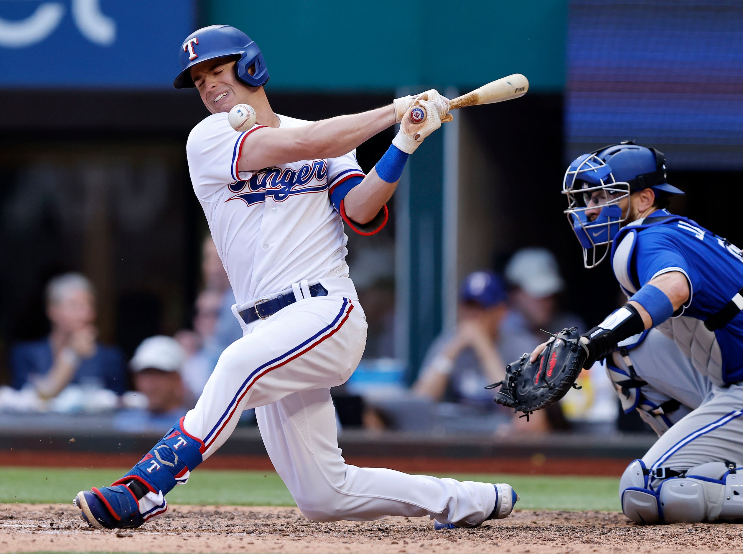 Texas Rangers second baseman Nick Solak (15) fouls a ball off his foot during sixth inning...