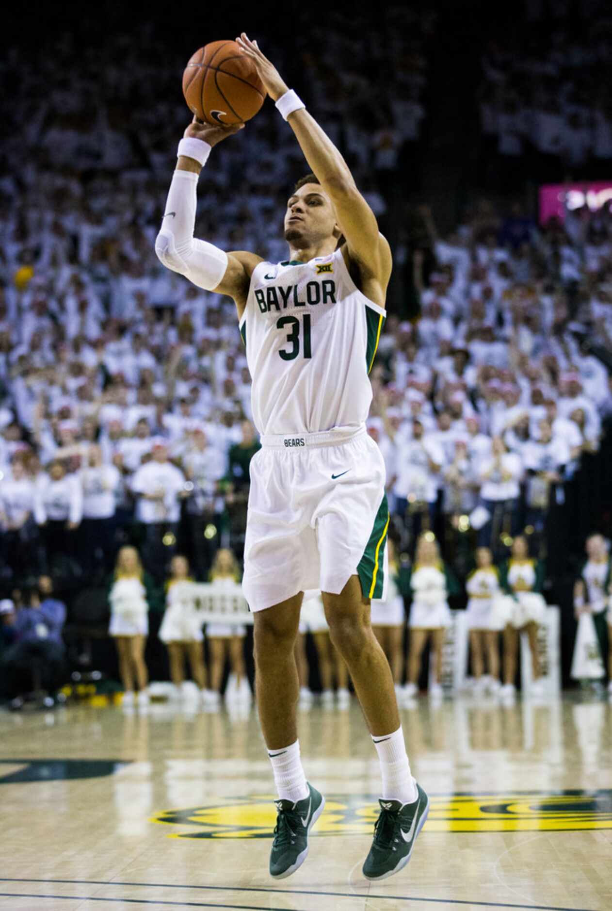 Baylor Bears guard MaCio Teague (31) makes a three-pointer to narrow the score to a one...