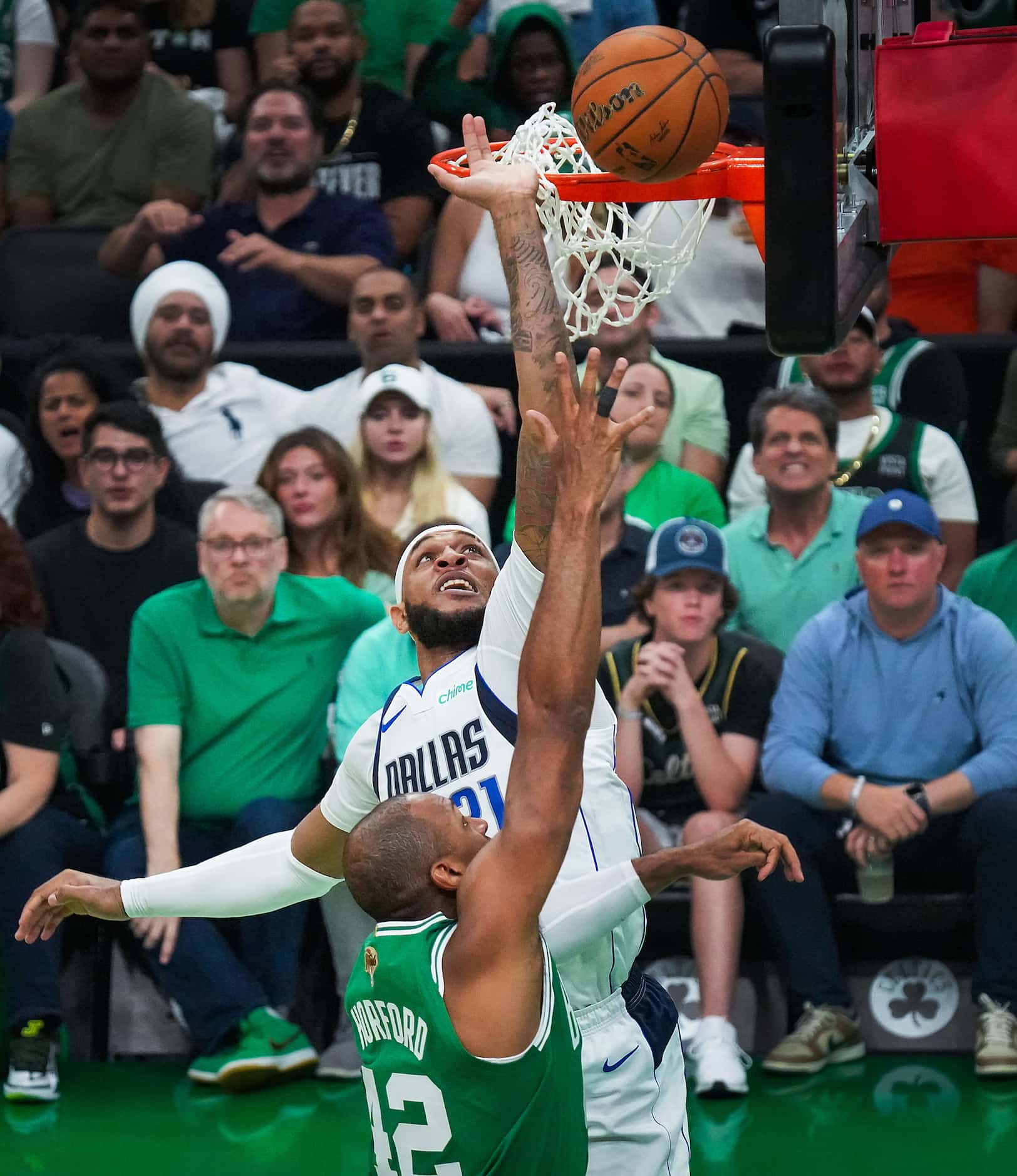 Boston Celtics center Al Horford (42) scores past Dallas Mavericks center Daniel Gafford...