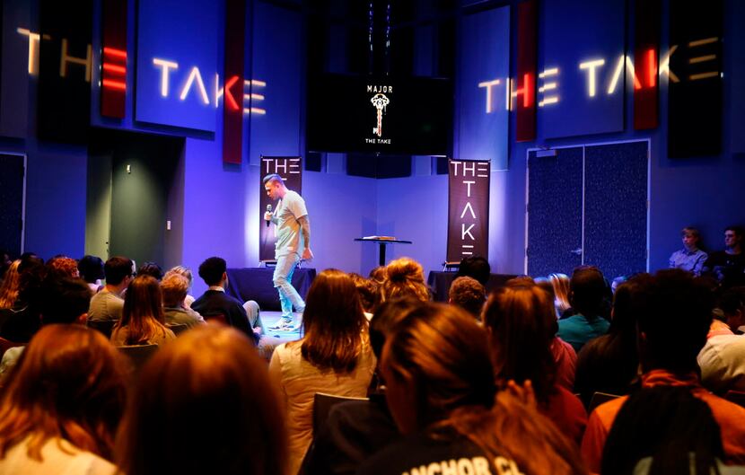 Landon Pickering, student pastor at River Pointe Church leads "The Take," a youth gathering...