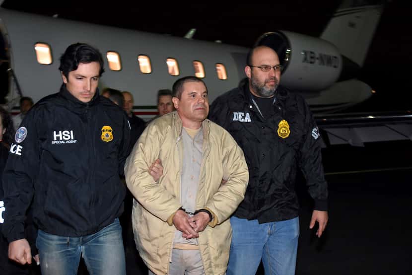 In this Jan. 19, 2017, photo provided by U.S. law enforcement, authorities escort Joaquin...