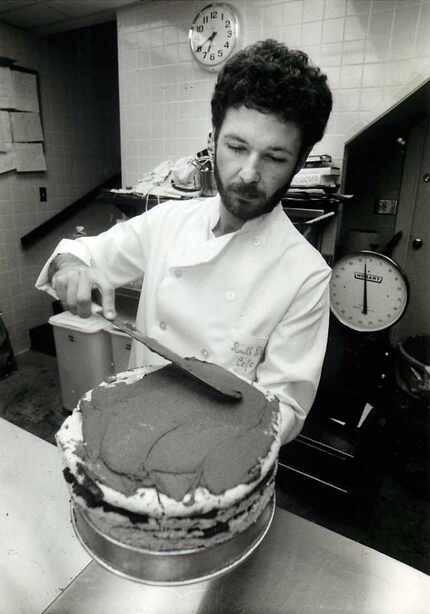 Stephan Pyles icing a cake in his kitchen at Routh Street Cafe on December 10, 1983   