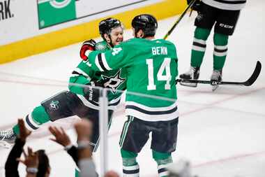 Dallas Stars right wing Evgenii Dadonov (63) is congratulated on his second period goal by...