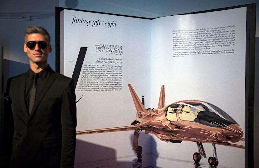 Model Erik Neff stands in front of a display of a Neiman Marcus fantasy gift in 2016, a $1.5...