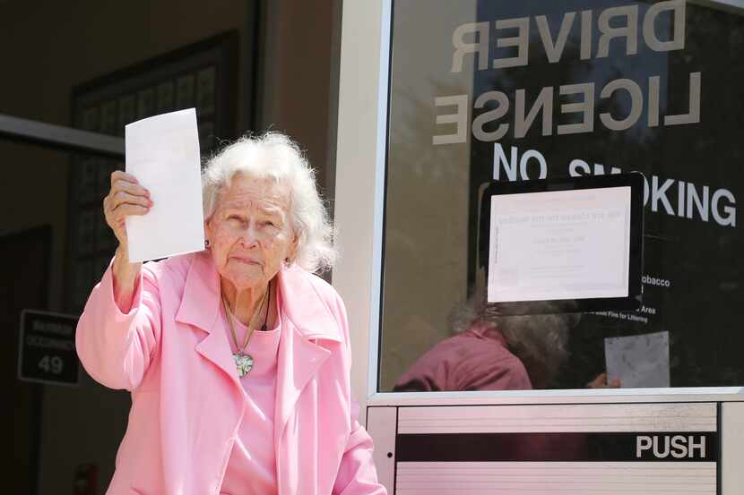 In this photo taken May 20, 2014, Ruby Barber, 92, leaves the Texas Department Public Safety...