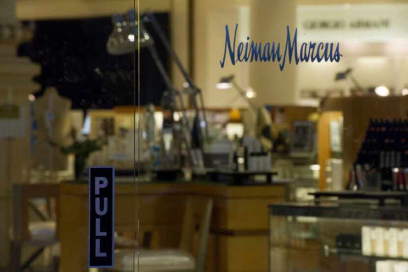 Although its sales rose 5.7 percent, Neiman Marcus reported Tuesday that it had a loss of...