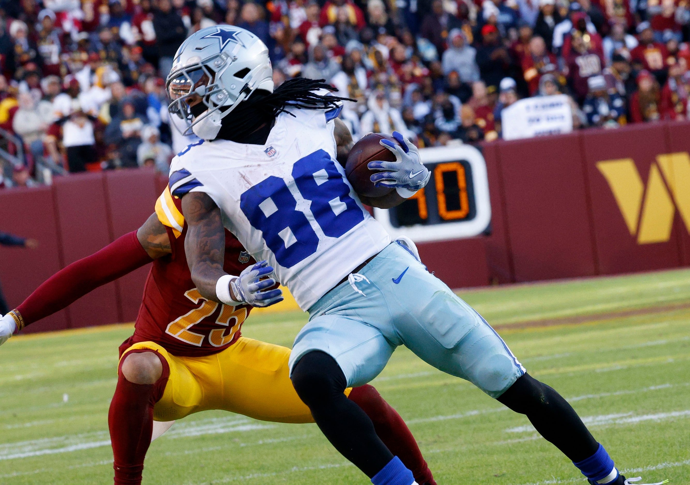 Dallas Cowboys wide receiver CeeDee Lamb (88) carries the ball against Washington Commanders...