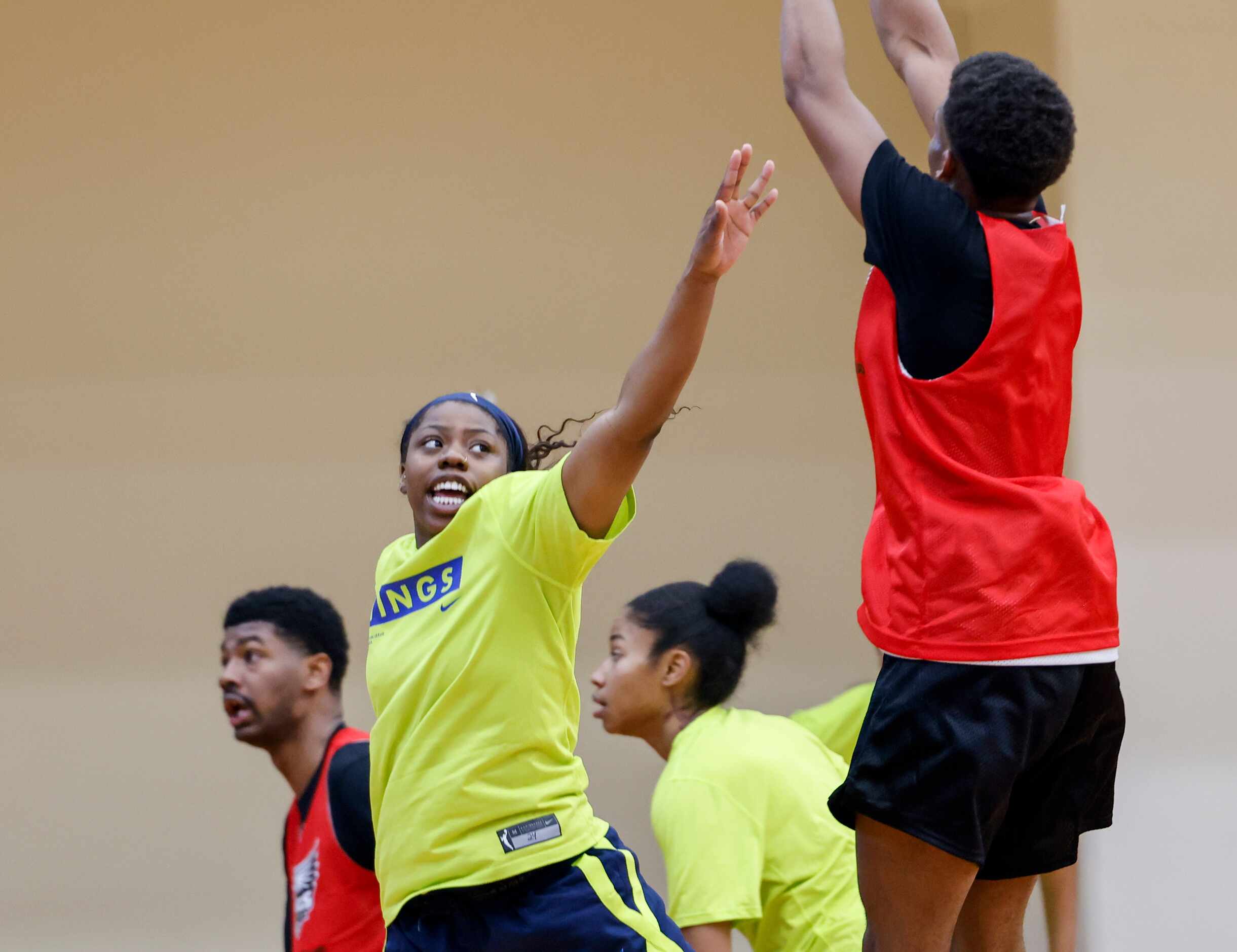 Dallas Wings guard Arike Ogunbowale attempts to block during a training camp practice on...