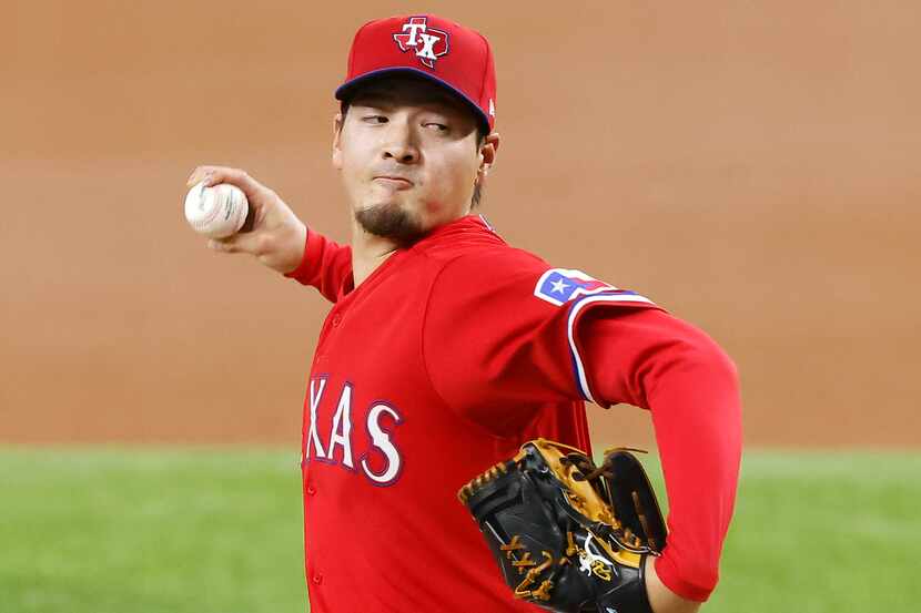 Texas Rangers starting pitcher Kohei Arihara (35) throws against the Boston Red Sox during...