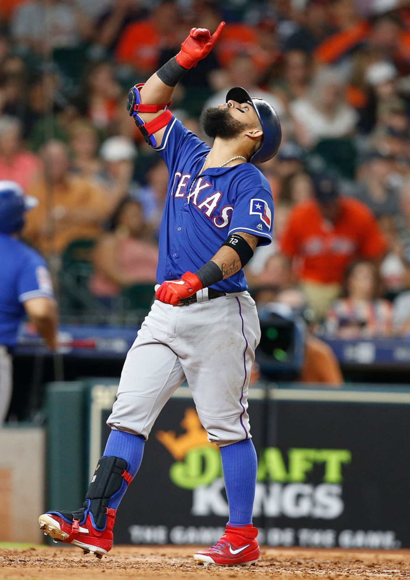 HOUSTON, TEXAS - JULY 19: Rougned Odor #12 of the Texas Rangers celebrates his sixth inning...