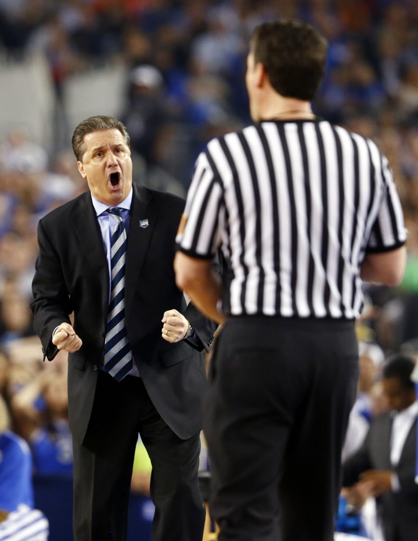 Kentucky Wildcats head coach John Calipari argues with an official during the second half of...