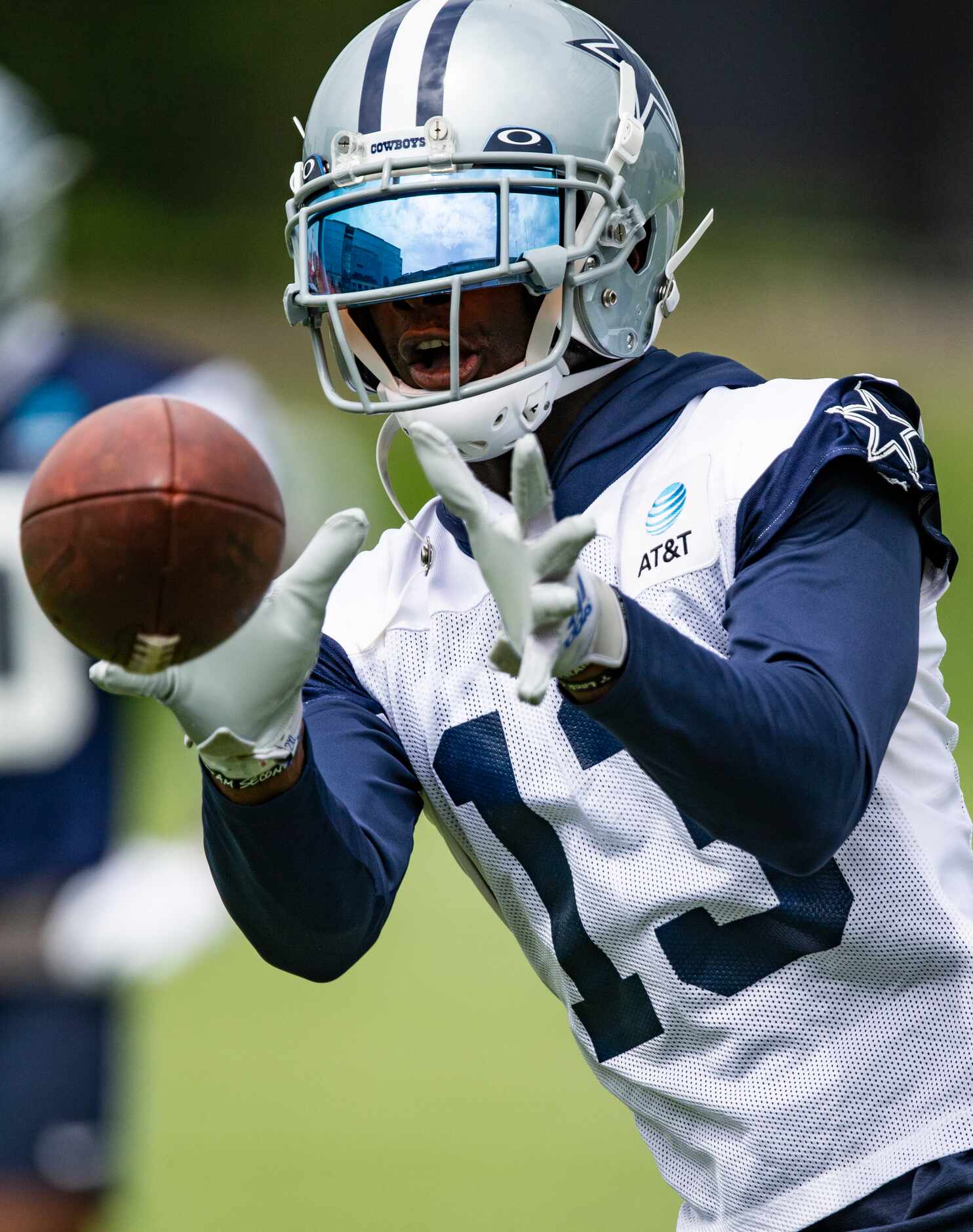 Dallas Cowboys wide receiver Michael Gallup (13) catches a pass during practice at The Star...