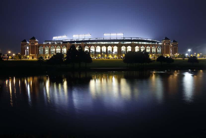 The lights are aglow as the Texas Rangers face the New York Yankees at the Rangers Ballpark...