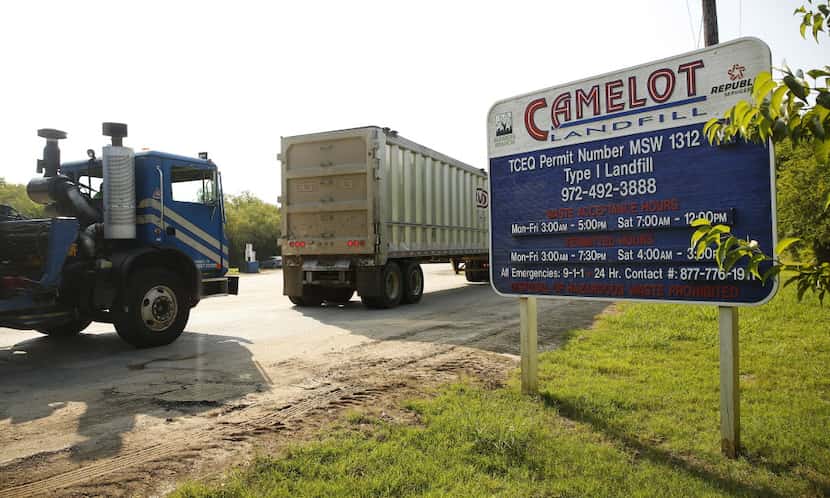 Trucks line up to be weighed as they enter Camelot Landfill in Lewisville, Texas, Wednesday,...