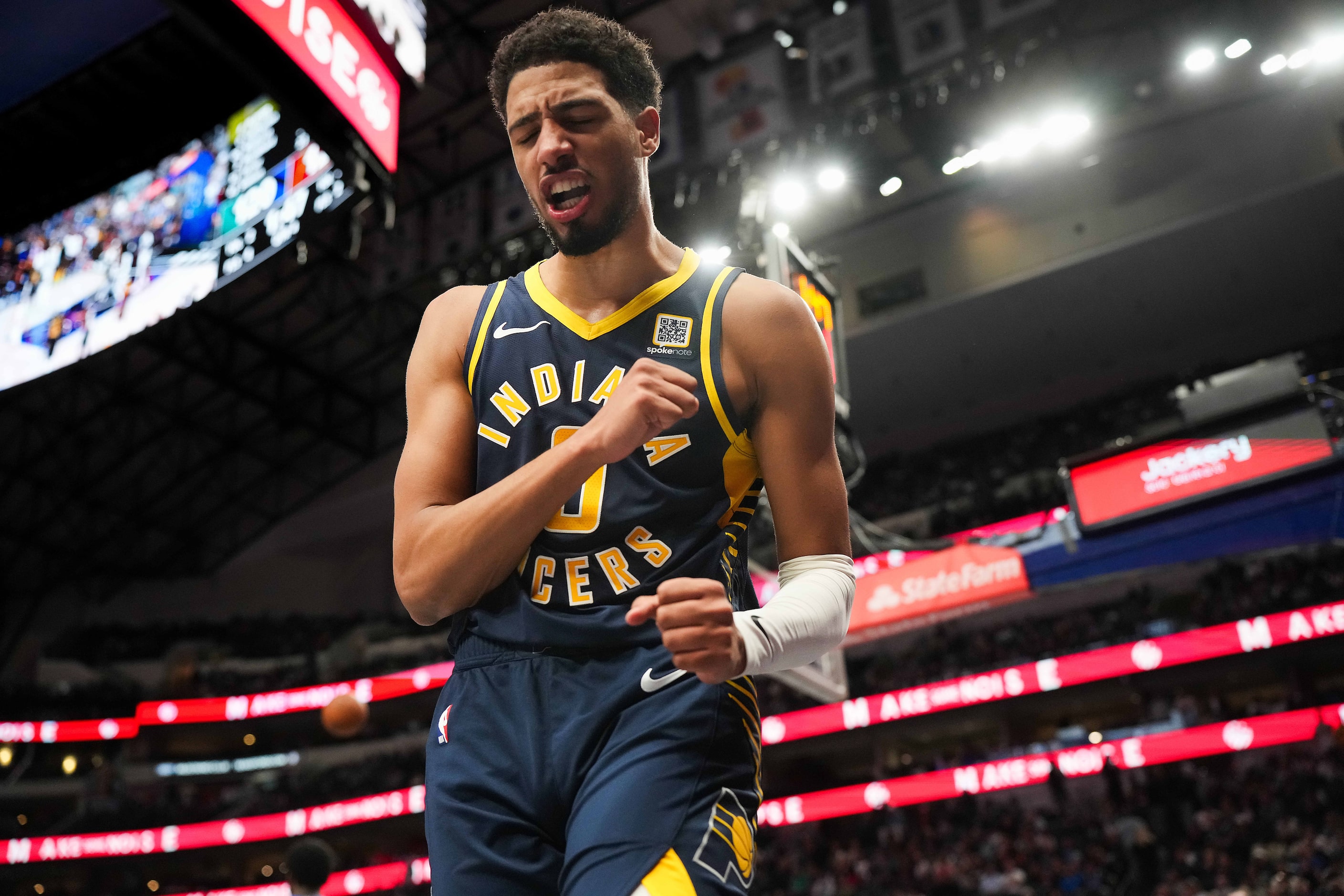 Indiana Pacers guard Tyrese Haliburton reacts after being fouled during the second half of...