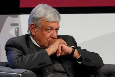 Mexican President-elect Andres Manuel Lopez Obrador listens during a meeting in Mexico City....