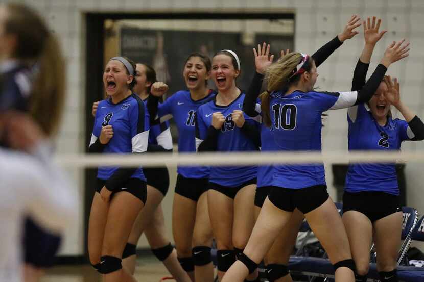 Hebron celebrates winning game two to even up their match as Allen High School hosted Hebron...