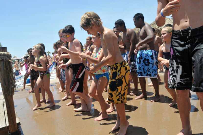 Hawaiian Falls Summer Splash Camps feature water-based activities for kids.