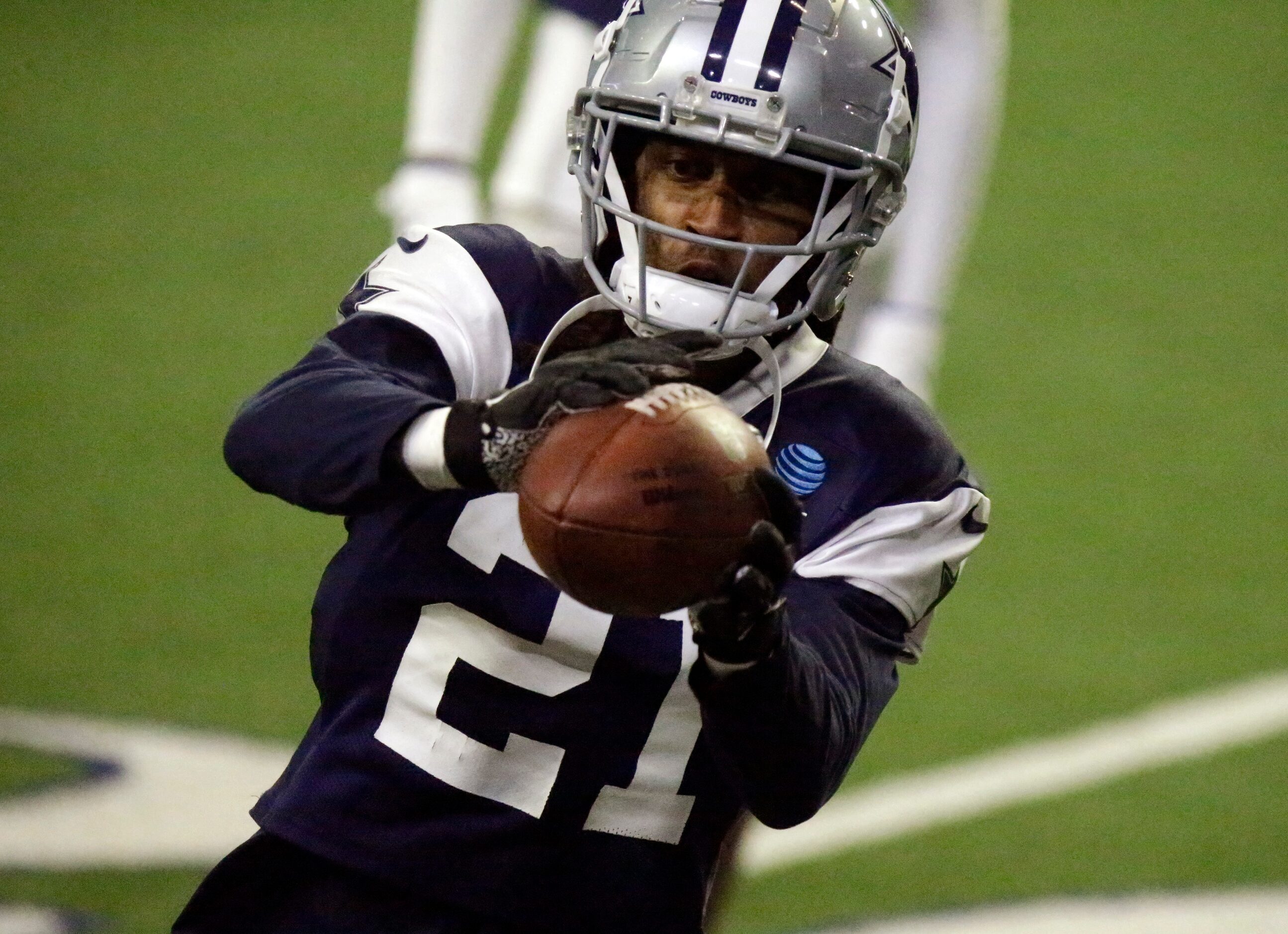 Dallas Cowboys cornerback Stephon Gilmore (21) catches a pass during a drill as the Dallas...