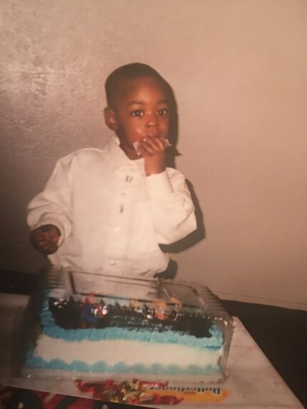 Ben Banogu eats birthday cake on his third birthday.