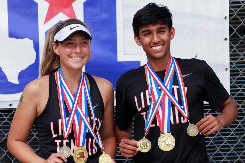Frisco Liberty’s Milla Dopson (left) and Sanjheev Rao pose for photos with their...