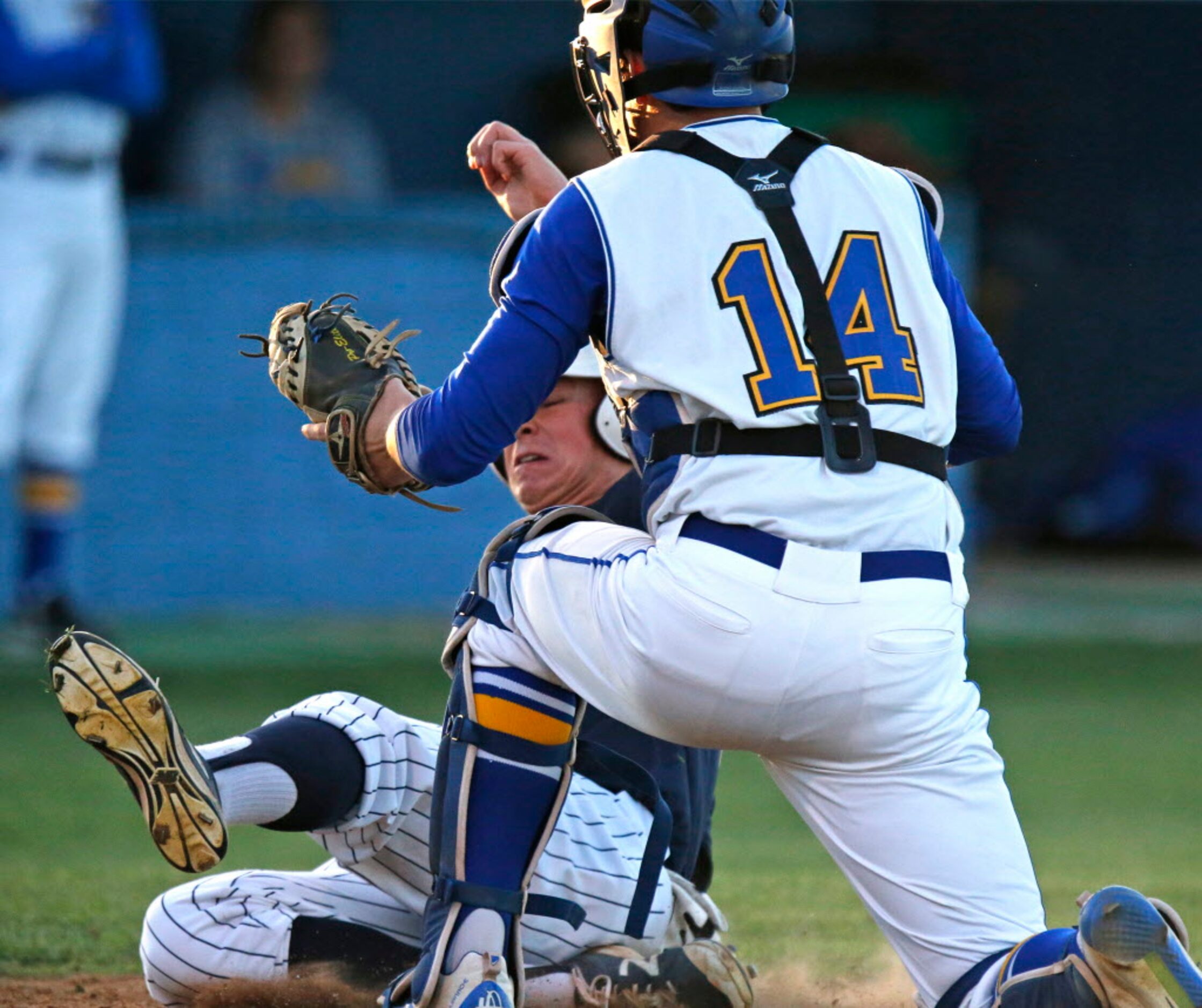 Wakeland High School first baseman Jared Martin (22) was safe at the plate as Frisco High...