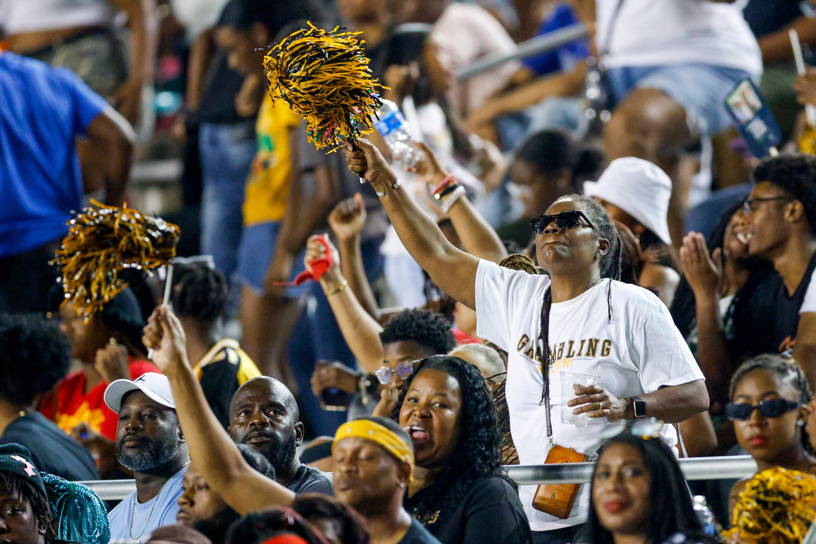 Grambling State fans celebrate a touchdown during the second half of the State Fair Classic...