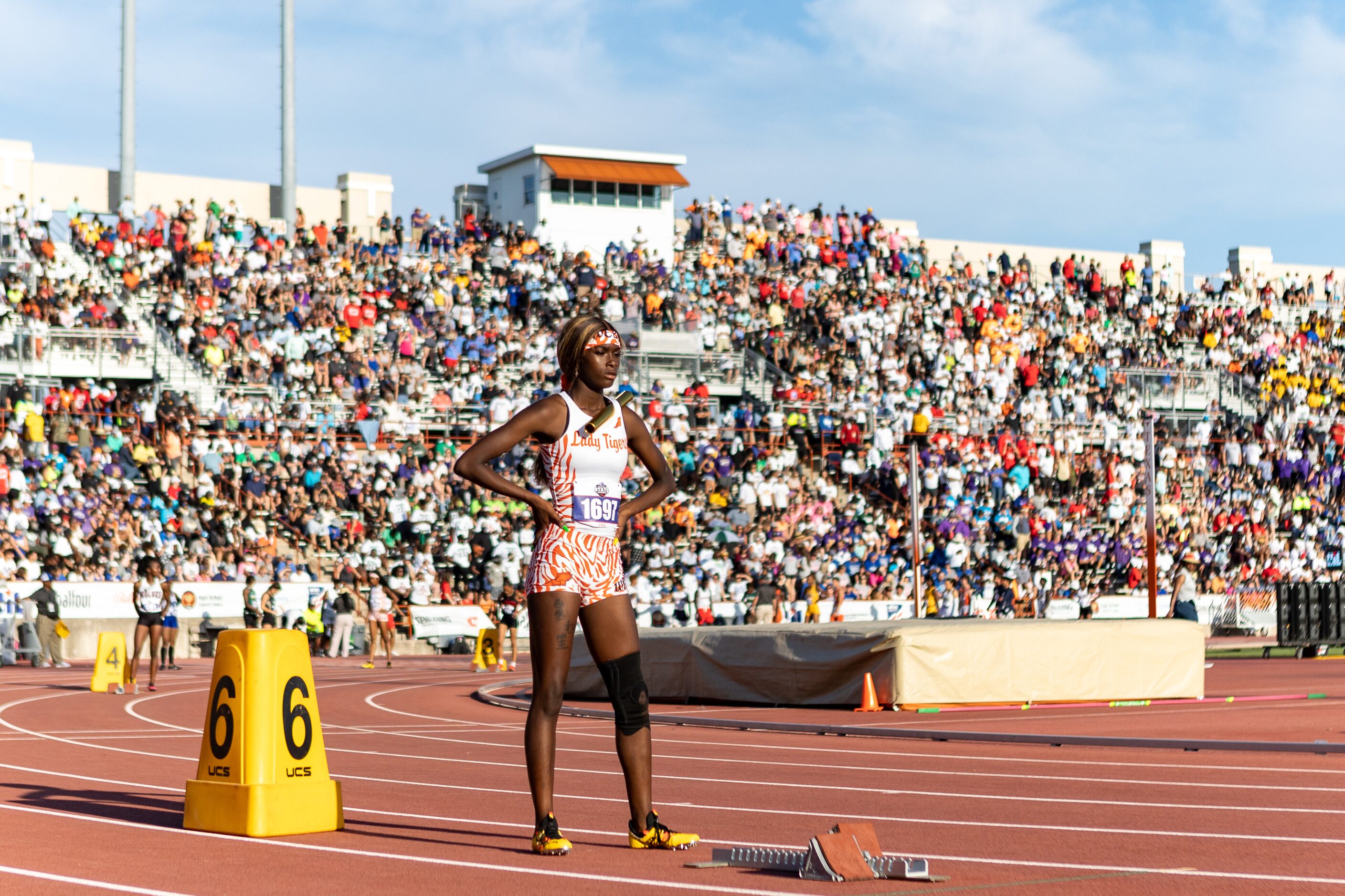 Leeira Williams prepares to lead off the girls’ 4x200 relay for Lancaster at the UIL Track &...