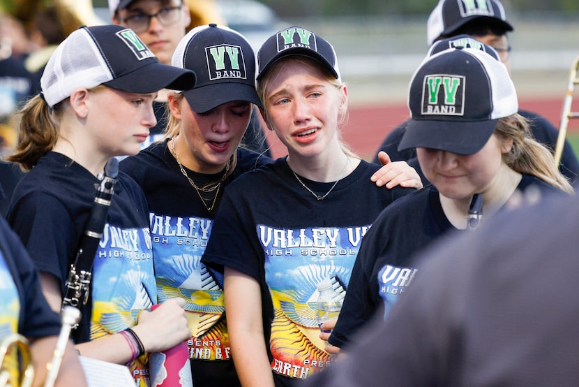 Valley View High School band members Marley Church, 16 (from left), Cate Davis, 14, and Ella...