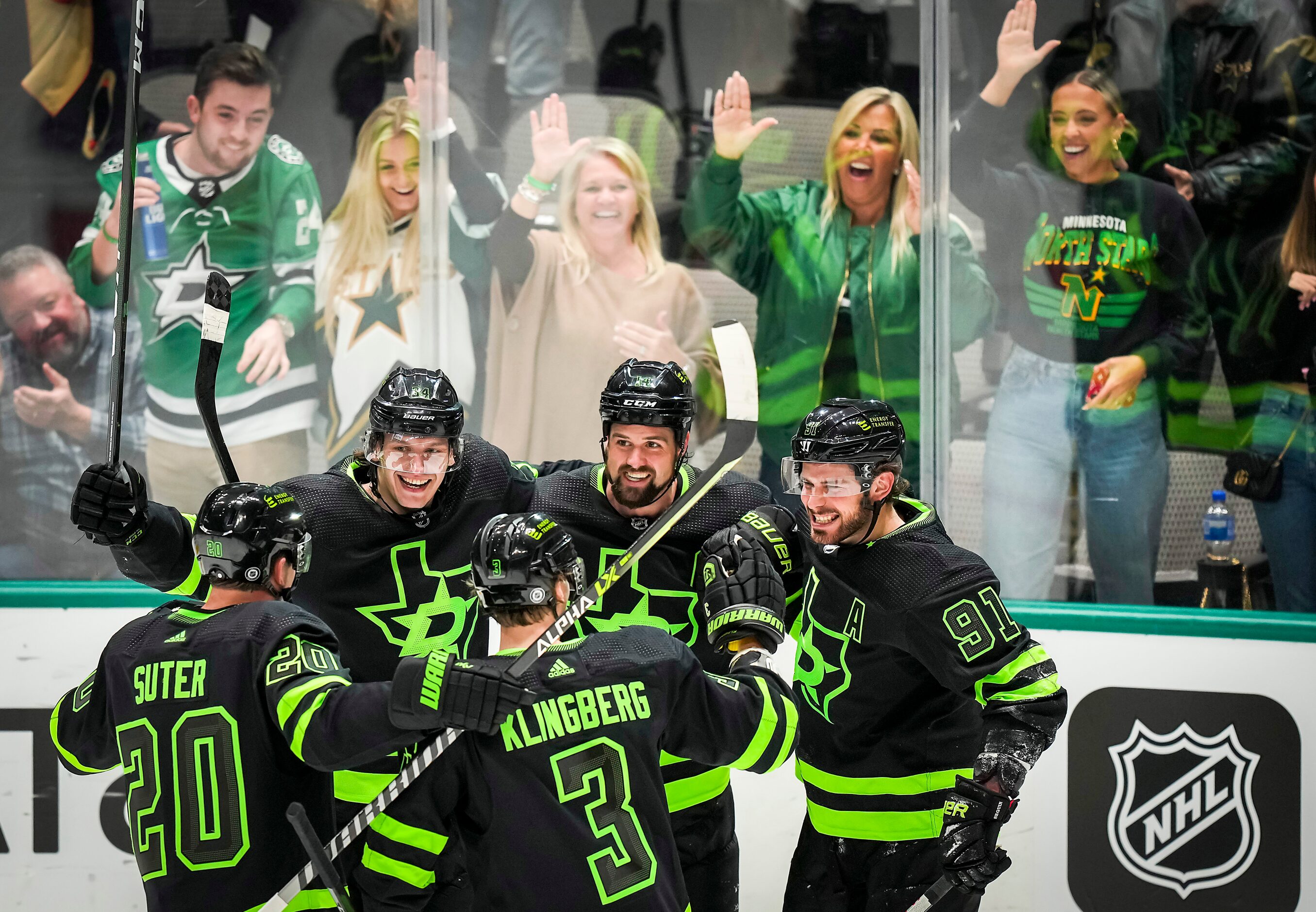 Dallas Stars center Tyler Seguin (91) celebrates with left wing Jamie Benn (14), right wing...