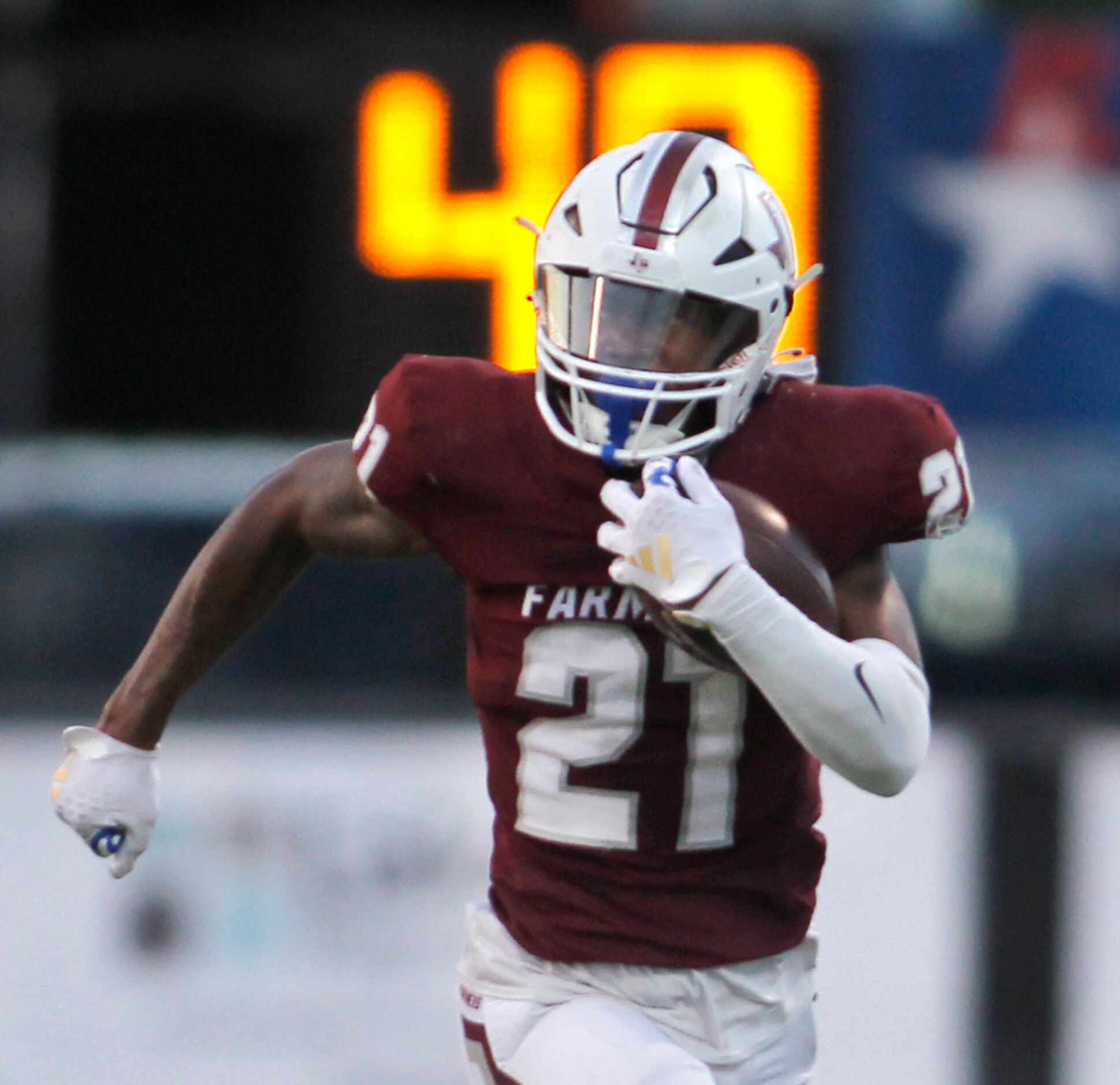 Lewisville running back Viron Ellison (21) rushes for a big gain during first half action...