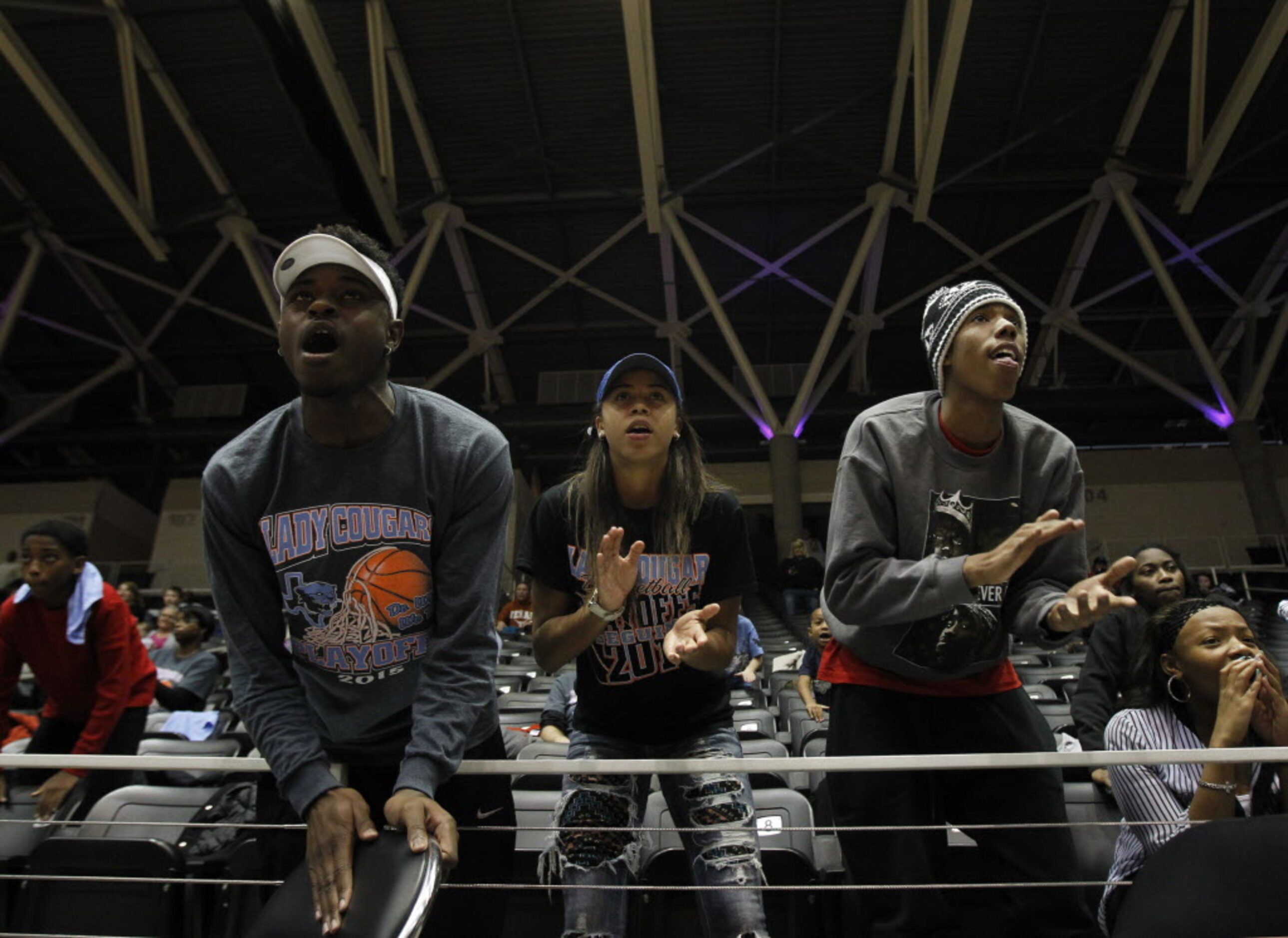 From left, Arlington Seguin students Jaylin Craw, Jasmine Demis and Clark Foletac watch as...