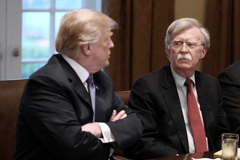 President Donald Trump and John Bolton, national security adviser, attended a briefing from...