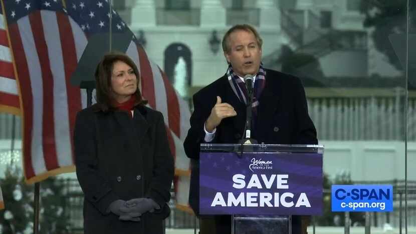 Texas Attorney General Ken Paxton, accompanied by his wife, state Sen. Angela Paxton, spoke...