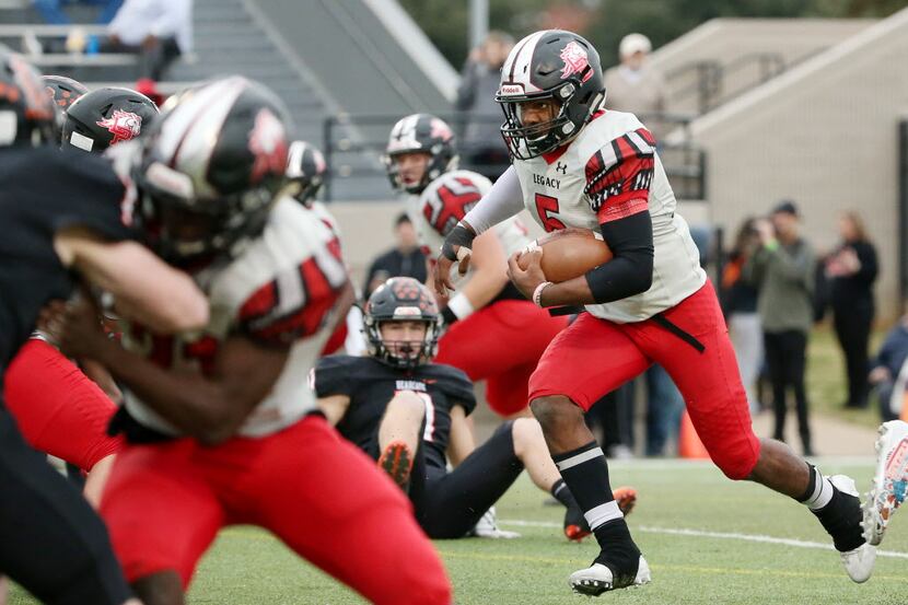 Mansfield Legacy defensive back Jalen Catalon (5) rushes for a touchdown to make the score...