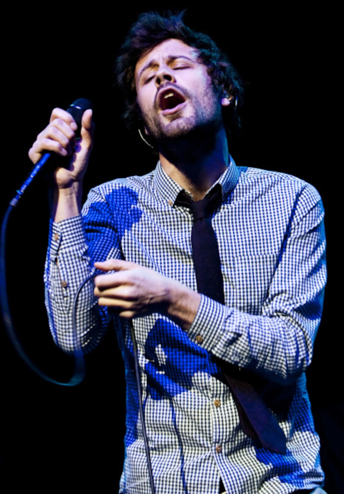 Passion Pit vocalist Michael Angelakos performs during the "How the Edge Stole Christmas"...