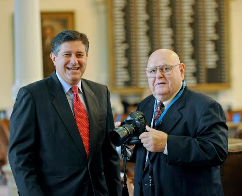 Rep. Richard Raymond (left) is shown with former Associated Press photographer Harry...