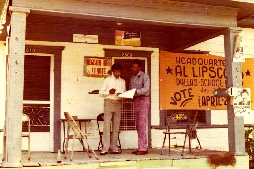 Al Lipscomb (right) talked with a resident on the porch of his South Dallas Information...