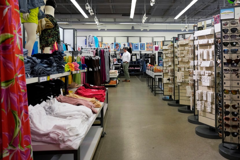 A customer shops at a retail store in Vernon Hills, Ill., Monday, June 12, 2023. On Tuesday,...