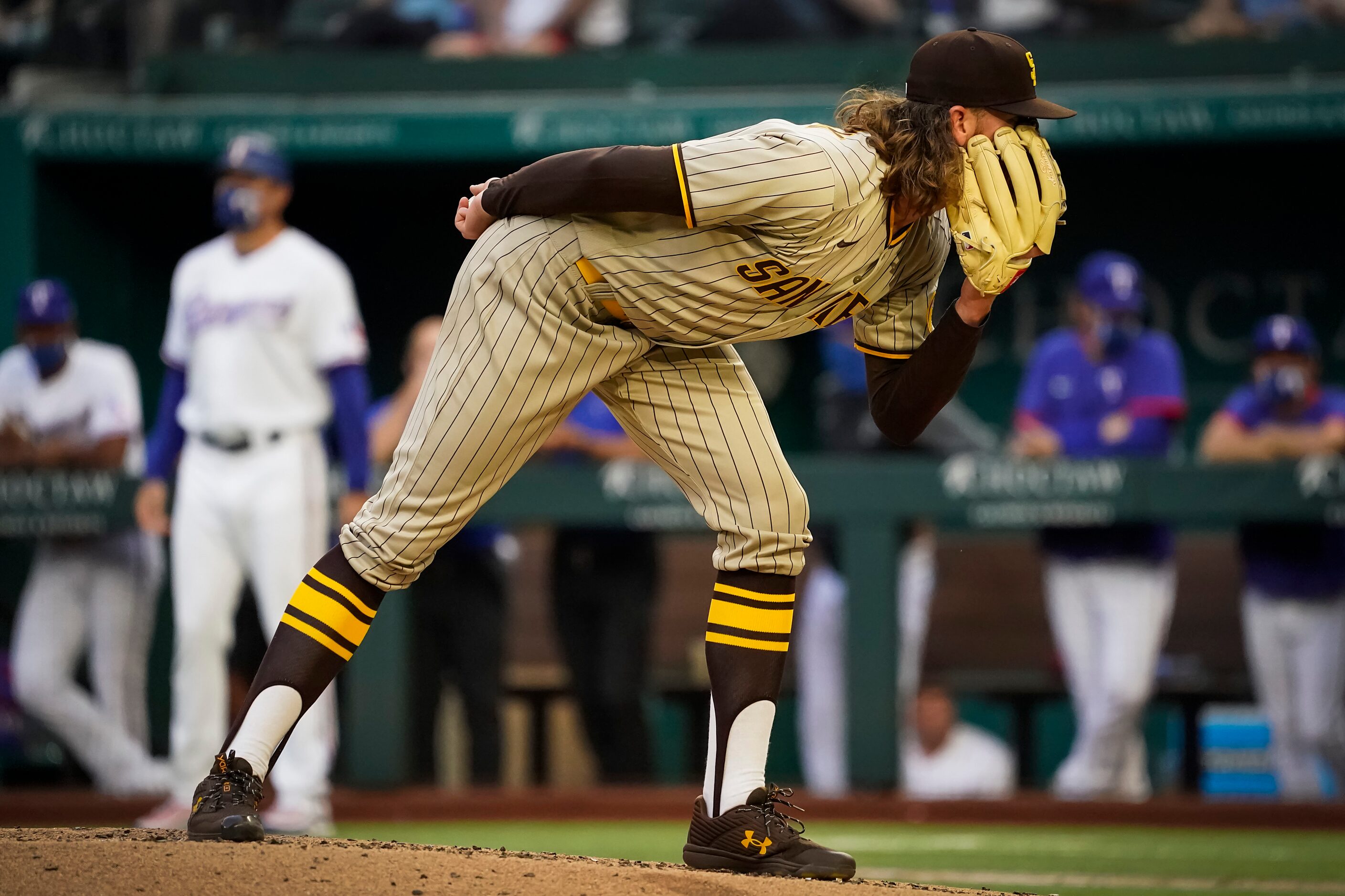 San Diego Padres starting pitcher Chris Paddack looks for a sign during the second inning...