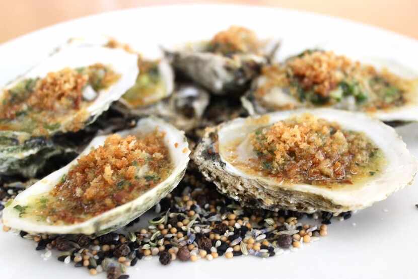 These oven roasted oysters from Savor come topped with tarragon, bacon butter and...