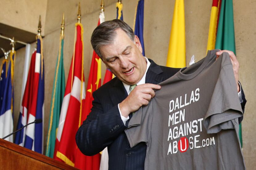 Dallas Mayor Mike Rawlings showed off the official shirt during his announcment detailing...