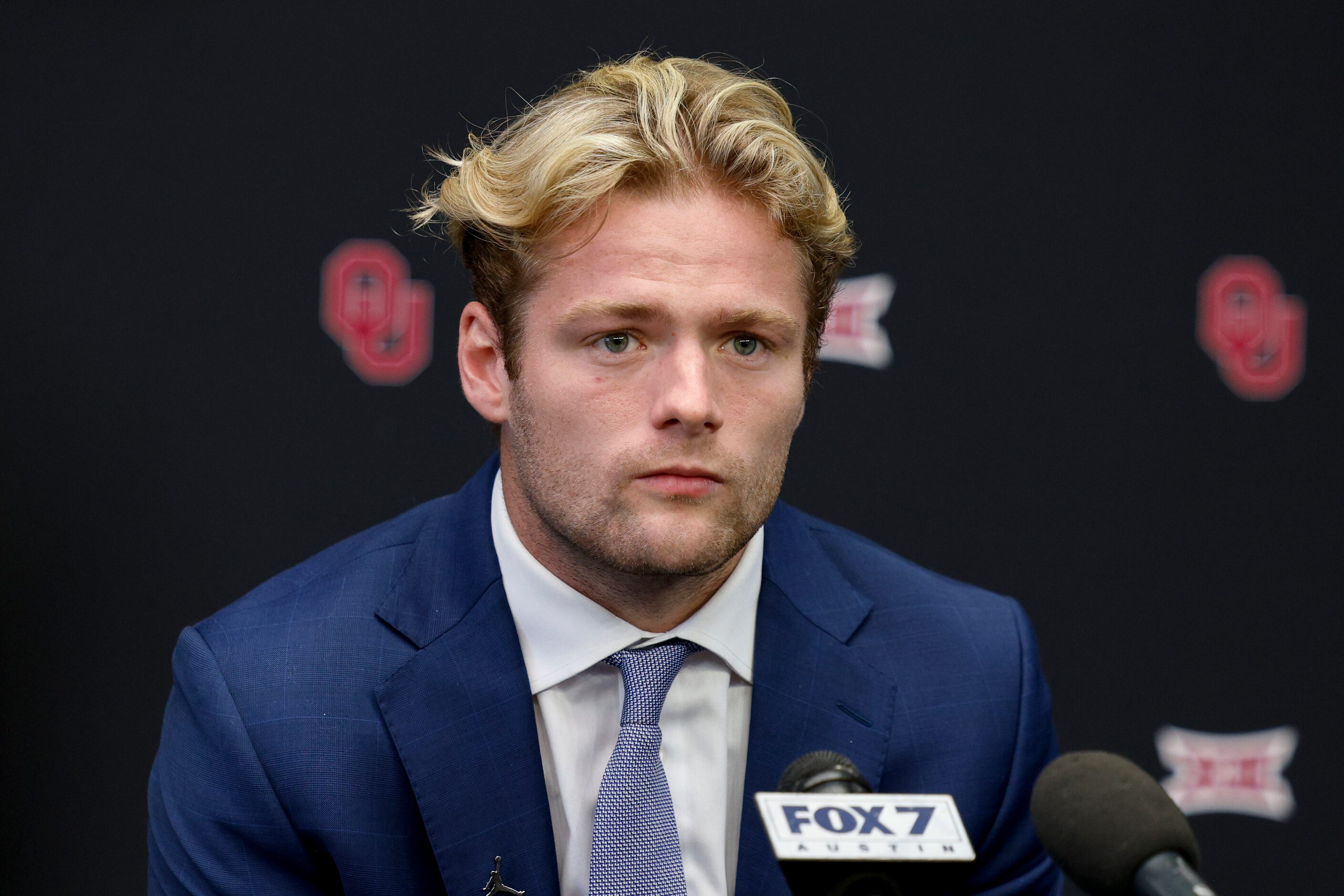 Oklahoma wide receiver Drake Stoops listens to a question during the Big 12 Media Days at...