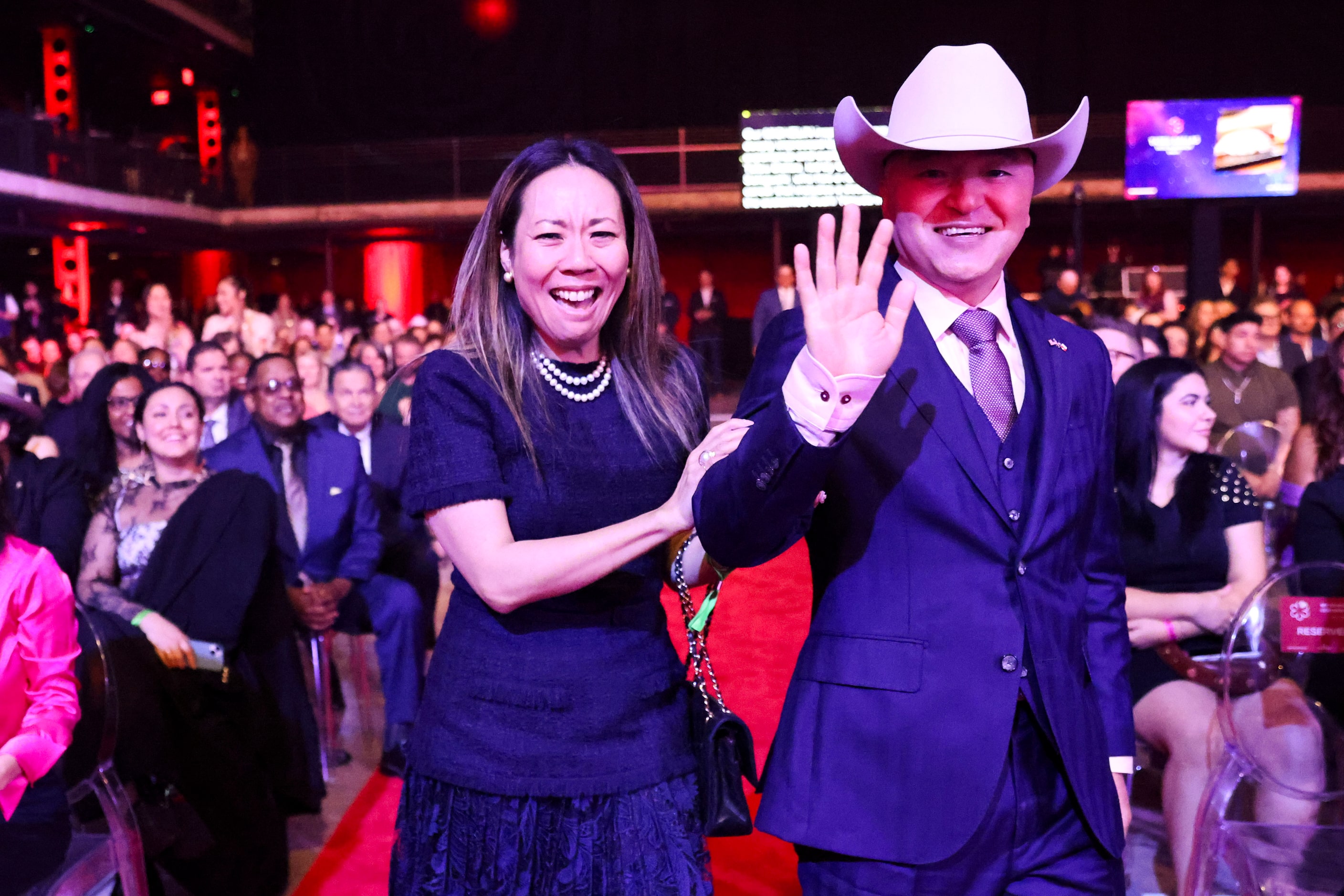 Hiroko Sekiguchi and her husband Chef Tatsuya Sekiguchi of Tatsu Dallas make their way to...