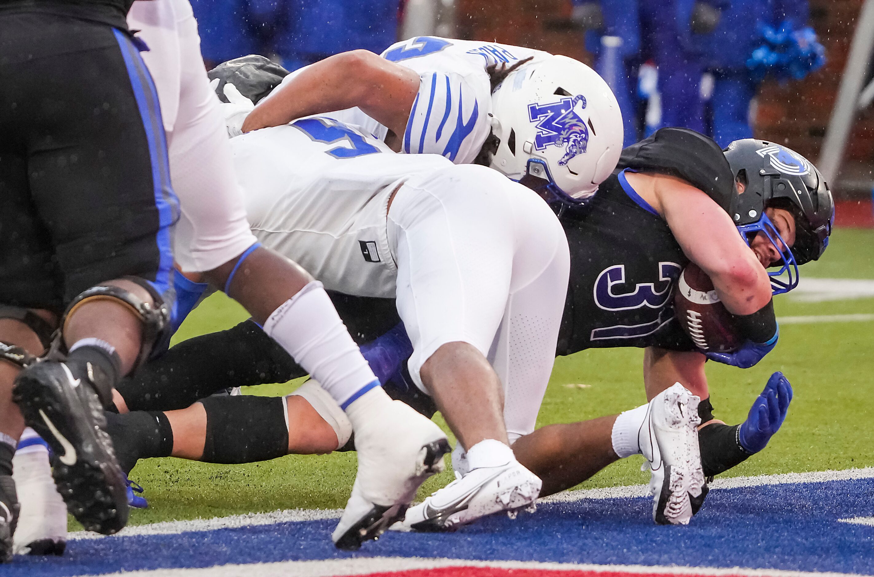 SMU running back Tyler Lavine (31) stretched for the end zone to score on a touchdown run...