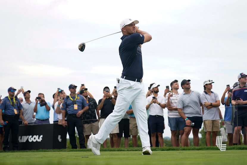 Bryson DeChambeau hits off the ninth tee during the first round of the Bedminster...