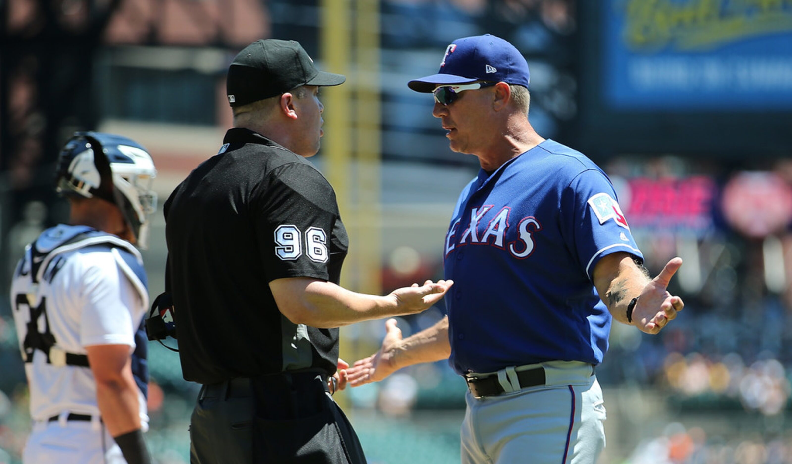 DETROIT, MI - JULY 8: Texas Rangers manager Jeff Banister argues with home plate umpire...